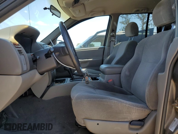 2000 Jeep Grand Cherokee Laredo with VIN 1J4G248S6YC333068, listed as a Copart auction lot 54972765 with 183,775 mi miles and Clean title. Bid and sale history available at DreamBid. Image 7.
