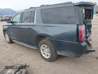 2019 GMC Yukon XL SLT with VIN 1GKS2GKC0KR345860, listed as a IAAI auction lot 40727072 with 127,568 mi miles and . Bid and sale history available at carsss.com. Image 3.