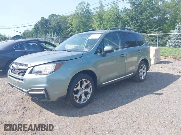 2017 Subaru Forester Touring with VIN JF2SJAWC8HH579492, listed as a IAAI auction lot 42571986 with 57,228 mi miles and . Bid and sale history available at DreamBid. Image 17.