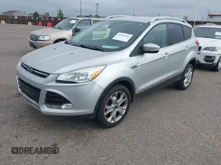 2016 Ford Escape Titanium with VIN 1FMCU9JX3GUC86930, listed as a IAAI auction lot 42582263 with 113,386 mi miles and . Bid and sale history available at DreamBid. Image 2.