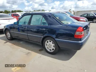 1996 Mercedes-Benz C with VIN WDBHA28E3TF392659, listed as a Copart auction lot 75169934 with Not Provided miles and Salvage Title. Bid and sale history available at carsss.com. Image 2.