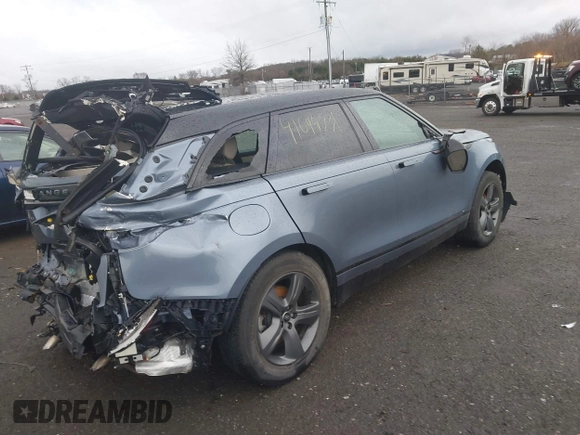2021 Land Rover Range Rover Velar R-Dynamic S z VIN SALYT2EX7MA313759, wystawiony jako IAAI lot #41694731 z przebiegiem Nie podano mil oraz . Historia ofert i sprzedaży dostępna na DreamBid. Obrazek 4.