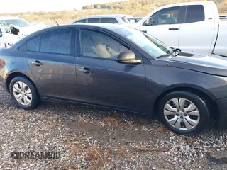 2014 Chevrolet Cruze LS z VIN 1G1PA5SH9E7480168, wystawiony jako IAAI lot #40937117 z przebiegiem 127 982 mil mil oraz . Historia ofert i sprzedaży dostępna na DreamBid. Obrazek 13.