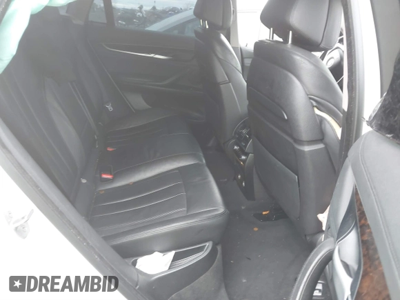 2015 BMW X6 xDrive35i with VIN 5UXKU2C57F0N77194, listed as a IAAI auction lot 41818860 with 105,579 mi miles and . Bid and sale history available at DreamBid. Image 8.