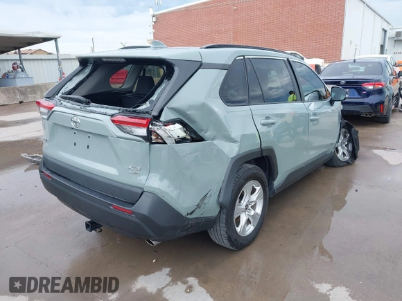 2021 Toyota RAV4 XLE with VIN 2T3P1RFV6MW216410, listed as a IAAI auction lot 42474822 with 37,503 mi miles and . Bid and sale history available at DreamBid. Image 4.