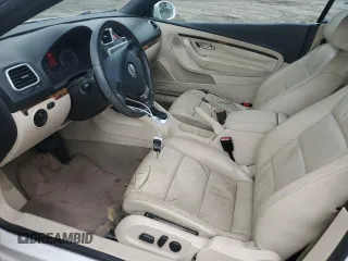 2007 Volkswagen Eos 2.0T with VIN WVWFA71F47V033566, listed as a Copart auction lot 66134234 with 93,923 mi miles and Salvage Title. Bid and sale history available at DreamBid. Image 7.