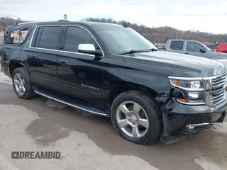2019 Chevrolet Suburban Premier with VIN 1GNSKJKC7KR261826, listed as a IAAI auction lot 41652451 with 127,032 mi miles and . Bid and sale history available at DreamBid. Image 1.