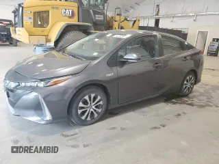 2021 Toyota Prius LE с VIN JTDKAMFP6M3192580, выставлен на аукционе Copart как лот 58208295 с пробегом 51 915 миль миль и Списание • Salvage title. История ставок и продаж доступна на DreamBid. Изображение 1.