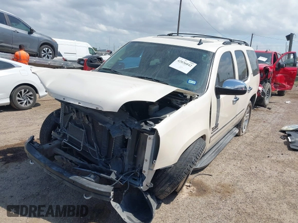 2013 GMC Yukon SLT with VIN 1GKS1CE0XDR276496, listed as a IAAI auction lot 42036042 with 157,047 mi miles. Bid and sale history available at carsss.com. Image 18.