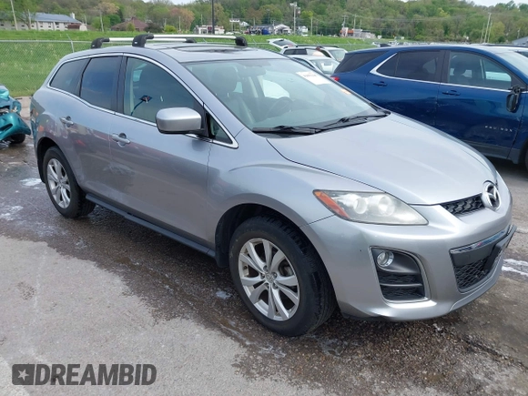 2011 Mazda CX-7 S Touring z VIN JM3ER4C30B0393887, wystawiony jako IAAI lot #42093166 z przebiegiem 123 920 mil mil oraz . Historia ofert i sprzedaży dostępna na DreamBid. Obrazek 1.
