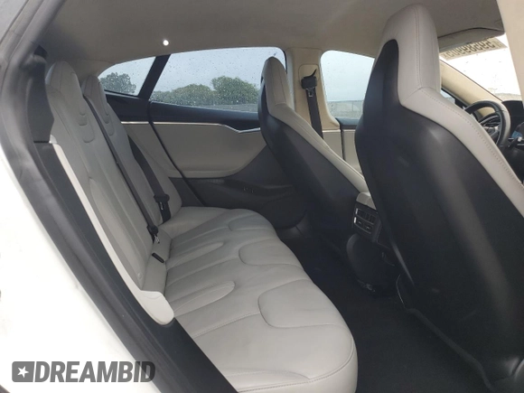 2014 Tesla Model S 60 с VIN 5YJSA1H19EFP52457, выставлен на аукционе Copart как лот 59589905 с пробегом 167 662 миль миль и Списание • Salvage title. История ставок и продаж доступна на DreamBid. Изображение 10.