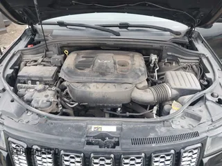 2017 Jeep Grand Cherokee Laredo with VIN 1C4RJFAG9HC882251, listed as a IAAI auction lot 41696710 with 129,627 mi miles and . Bid and sale history available at DreamBid. Image 10.