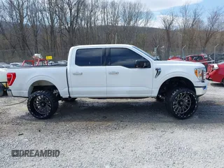 2023 Ford F-150 XL with VIN 1FTEW1C58PKE81292, listed as a IAAI auction lot 41900494 with 34,753 mi miles and . Bid and sale history available at DreamBid. Image 13.
