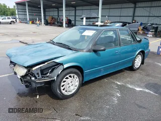 1995 Saturn SL with VIN 1G8ZK5271SZ147168, listed as a IAAI auction lot 42480978 with 159,136 mi miles and . Bid and sale history available at DreamBid. Image 2.