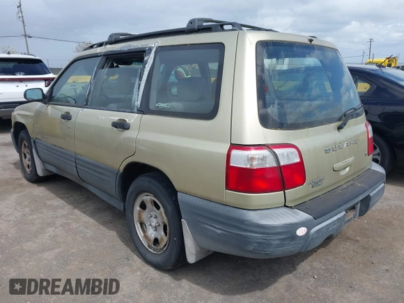 2001 Subaru Forester L with VIN JF1SF63511G703834, listed as a IAAI auction lot 41904604 with 137,225 mi miles. Bid and sale history available at carsss.com. Image 3.