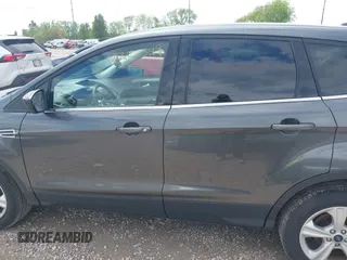 2016 Ford Escape SE with VIN 1FMCU9GXXGUC81604, listed as a IAAI auction lot 42222349 with 106,188 mi miles and . Bid and sale history available at DreamBid. Image 14.