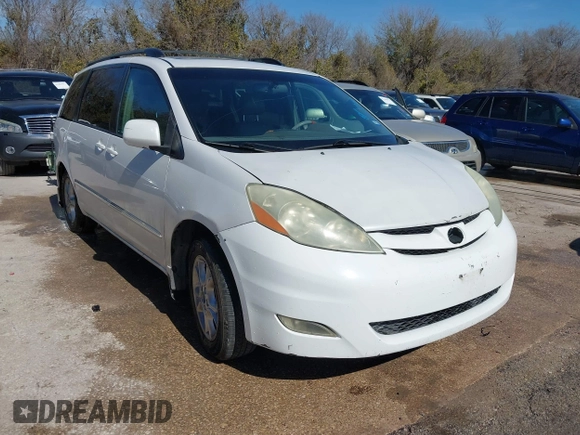 2006 Toyota Sienna XLE with VIN 5TDZA22C06S504271, listed as a IAAI auction lot 41573903 with 208,712 mi miles. Bid and sale history available at carsss.com. Image 1.
