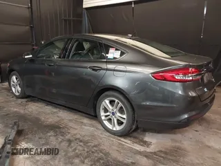 2018 Ford Fusion SE with VIN 3FA6P0HD5JR207844, listed as a IAAI auction lot 42534696 with 93,360 mi miles and . Bid and sale history available at DreamBid. Image 3.