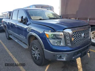 2016 Nissan Titan Platinum Reserve z VIN 1N6BA1F47GN502505, wystawiony jako IAAI lot #42520972 z przebiegiem 104 949 mil mil oraz . Historia ofert i sprzedaży dostępna na DreamBid. Obrazek 14.