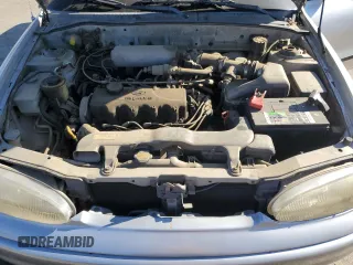 1996 Hyundai Accent z VIN KMHVF14N4TU316378, wystawiony jako Copart lot #88981945 z przebiegiem 128 650 mil mil oraz Tytuł czysty. Historia ofert i sprzedaży dostępna na DreamBid. Obrazek 11.
