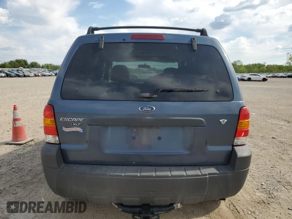2006 Ford Escape XLT with VIN 1FMCU03196KA23467, listed as a Copart auction lot 56059295 with 162,314 mi miles and Salvage title. Bid and sale history available at DreamBid. Image 6.