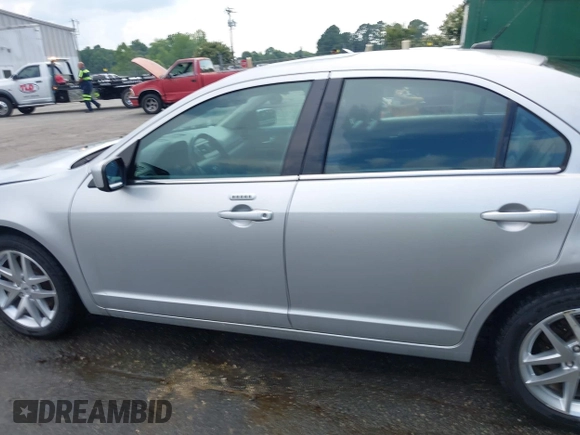 2012 Ford Fusion SEL with VIN 3FAHP0JAXCR359565, listed as a IAAI auction lot 42609189 with 211,017 mi miles and . Bid and sale history available at DreamBid. Image 14.