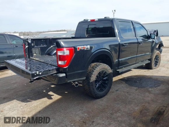 2023 Ford F-150 XL with VIN 1FTFW1E88PKE81241, listed as a IAAI auction lot 41235511 with 14,896 mi miles. Bid and sale history available at carsss.com. Image 4.