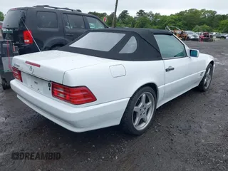 1991 Mercedes-Benz 500 z VIN WDBFA66E9MF020617, wystawiony jako IAAI lot #42355637 z przebiegiem 93 104 mil mil oraz . Historia ofert i sprzedaży dostępna na DreamBid. Obrazek 4.