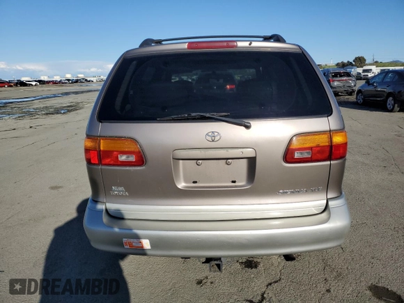 1999 Toyota Sienna LE with VIN 4T3ZF13C5XU144781, listed as a Copart auction lot 48932535 with 216,436 mi miles and Salvage Title. Bid and sale history available at carsss.com. Image 6.