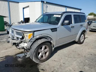 2011 Dodge Nitro SXT z VIN 1D4PT5GK5BW541154, wystawiony jako Copart lot #72741154 z przebiegiem 154 746 mil mil oraz Szkody całkowita. Historia ofert i sprzedaży dostępna na DreamBid. Obrazek 1.