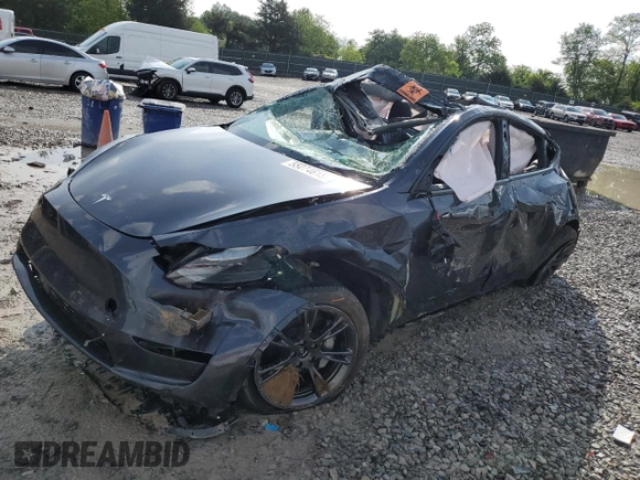 2024 Tesla Model Y Long Range z VIN 7SAYGDEEXRA324517, wystawiony jako Copart lot #55274615 z przebiegiem Nie podano mil oraz Szkoda całkowita • Salvage title. Historia ofert i sprzedaży dostępna na DreamBid. Obrazek 1.