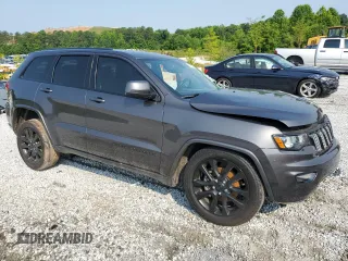 2018 Jeep Grand Cherokee Altitude with VIN 1C4RJEAG4JC145023, listed as a Copart auction lot 59001735 with 127,627 mi miles and Salvage title. Bid and sale history available at DreamBid. Image 4.