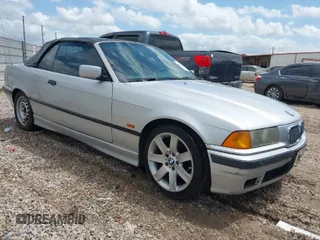 1998 BMW 3 Series 323icA with VIN WBABJ8334WEM22565, listed as a IAAI auction lot 41927799 with 165,077 mi miles. Bid and sale history available at carsss.com. Image 1.