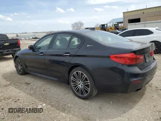 2018 BMW 5 Series 530e xDrive with VIN WBAJB1C51JG623953, listed as a Copart auction lot 51149905 with 86,799 mi miles and Salvage title. Bid and sale history available at DreamBid. Image 2.