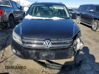 2015 Volkswagen Tiguan SE z VIN WVGBV7AX9FW516731, wystawiony jako Copart lot #49508815 z przebiegiem 172 072 mil mil oraz Szkoda całkowita • Salvage title. Historia ofert i sprzedaży dostępna na DreamBid. Obrazek 5.