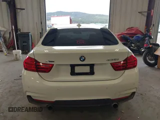 2015 BMW 4 Series 435i xDrive z VIN WBA4B3C53FD669771, wystawiony jako IAAI lot #41835401 z przebiegiem 145 570 mil mil oraz . Historia ofert i sprzedaży dostępna na DreamBid. Obrazek 16.