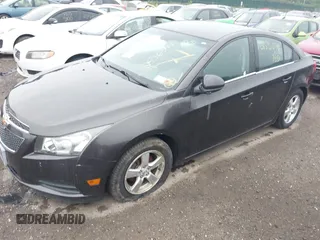 2014 Chevrolet Cruze 1LT with VIN 1G1PC5SB8E7317307, listed as a IAAI auction lot 42576237 with Not provided miles and . Bid and sale history available at DreamBid. Image 2.