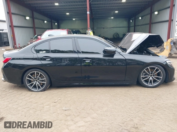2019 BMW 3 Series 330i xDrive with VIN WBA5R7C52KAJ87697, listed as a IAAI auction lot 41795207 with 53,760 mi miles. Bid and sale history available at carsss.com. Image 13.