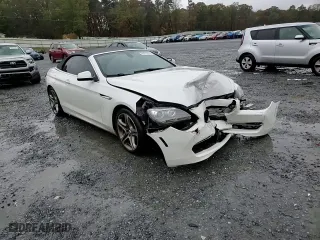 2012 BMW 6 Series 650i with VIN WBALZ3C5XCDL72984, listed as a Copart auction lot 80675974 with 99,354 mi miles and Salvage Title. Bid and sale history available at carsss.com. Image 10.