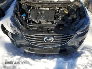 2016 Mazda CX-5 Grand Touring with VIN JM3KE4DY6G0655802, listed as a Copart auction lot 43820475 with 76,639 mi miles and Salvage Title. Bid and sale history available at carsss.com. Image 13.