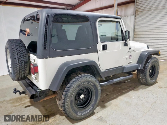 2001 Jeep Wrangler Sahara with VIN 1J4FA59S41P303519, listed as a Copart auction lot 59899545 with 238,151 mi miles and Clean title. Bid and sale history available at DreamBid. Image 3.