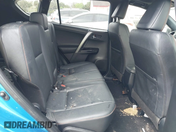 2016 Toyota RAV4 SE with VIN JTMJFREV3GJ076876, listed as a IAAI auction lot 41566899 with 133,216 mi miles and . Bid and sale history available at DreamBid. Image 8.