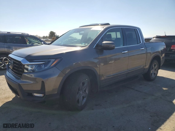 2021 Honda Ridgeline RTL-E with VIN 5FPYK3F70MB020640, listed as a Copart auction lot 48405105 with 67,647 mi miles and Salvage Title. Bid and sale history available at carsss.com. Image 1.