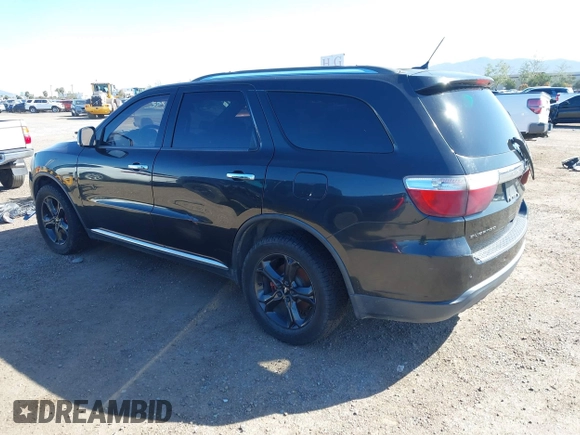 2013 Dodge Durango Crew with VIN 1C4RDHDG6DC508785, listed as a IAAI auction lot 41820911 with 186,359 mi miles. Bid and sale history available at carsss.com. Image 3.