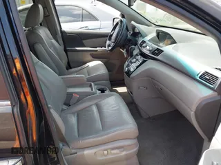 2011 Honda Odyssey EX-L with VIN 5FNRL5H62BB063125, listed as a IAAI auction lot 42562541 with 140,787 mi miles and . Bid and sale history available at DreamBid. Image 5.