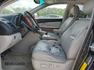 2008 Lexus RX 400h with VIN JTJGW31U582851546, listed as a Copart auction lot 52691335 with 152,790 mi miles and Salvage Title. Bid and sale history available at DreamBid. Image 7.