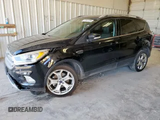 2018 Ford Escape Titanium with VIN 1FMCU0J90JUA22116, listed as a Copart auction lot 57831255 with 145,761 mi miles and Salvage title. Bid and sale history available at DreamBid. Image 1.