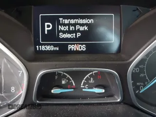 2016 Ford Focus Titanium with VIN 1FADP3J21GL404602, listed as a IAAI auction lot 42270177 with 118,369 mi miles and . Bid and sale history available at DreamBid. Image 16.