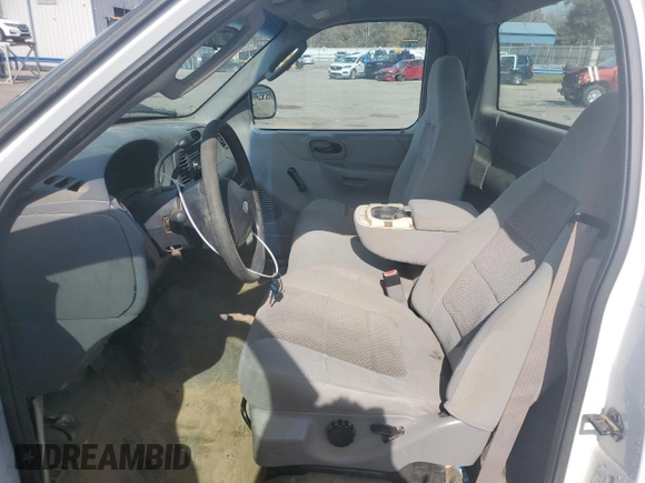 2003 Ford F-150 XL with VIN 1FTRF17W33NA54471, listed as a Copart auction lot 42594765 with 134,409 mi miles and Salvage Title. Bid and sale history available at DreamBid. Image 7.