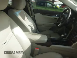 2014 Cadillac XTS Luxury with VIN 2G61M5S35E9199253, listed as a IAAI auction lot 41400558 with 112,955 mi miles. Bid and sale history available at carsss.com. Image 5.
